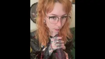 Sexy Tattooed Redhead Sucks Dildo